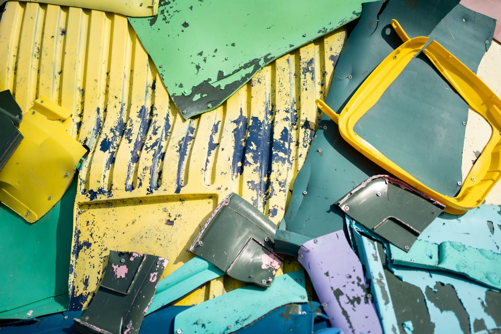 Closeup of multicolored plastic waste pile background